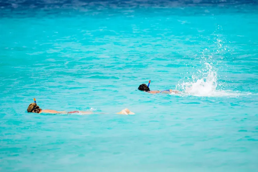 Clear turquoise water over a shallow bay bottom