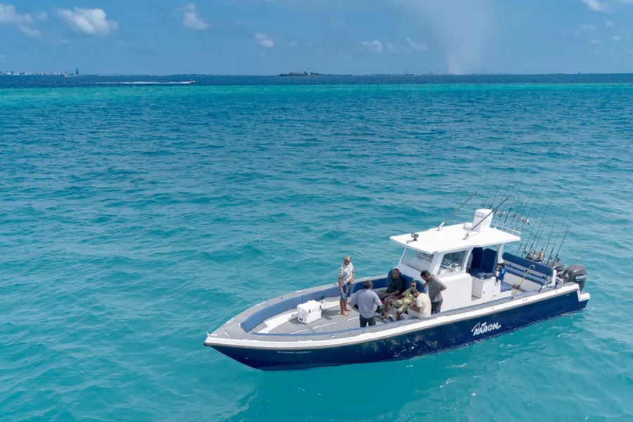 Anglers fishing from a charter boat on the open Gulf