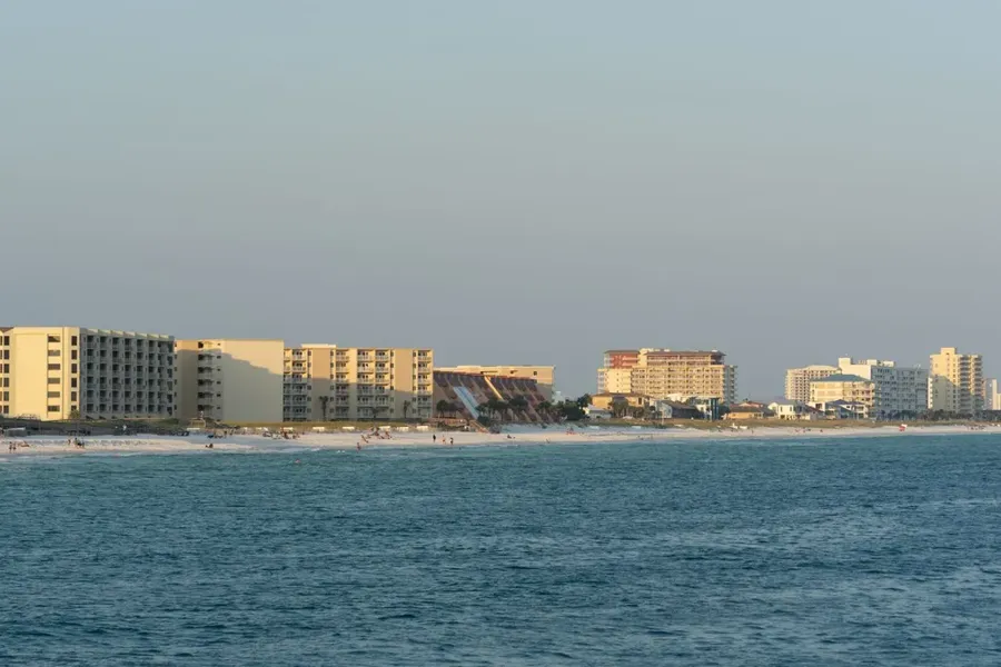 Beachfront condos along the shoreline, seen from the water
